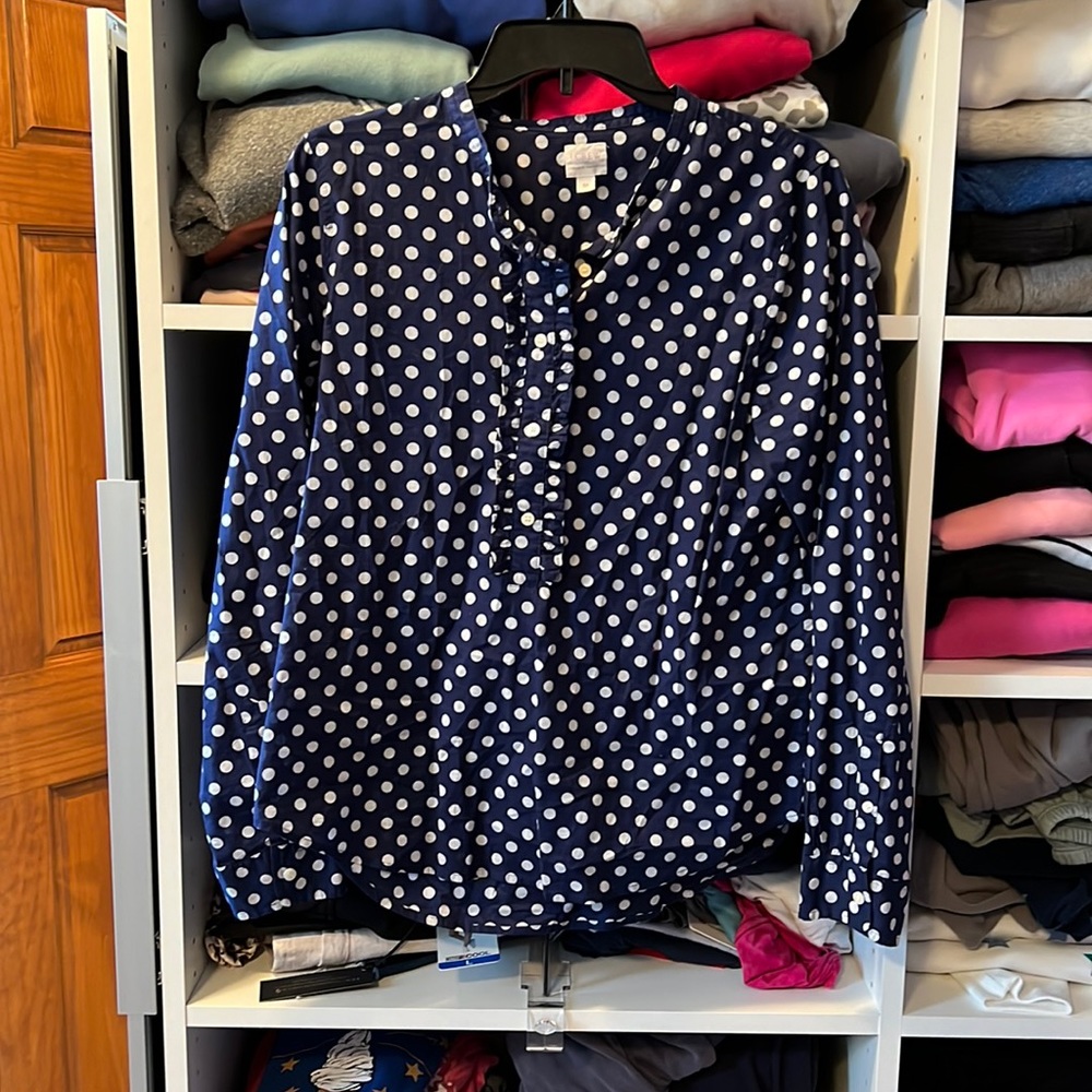 Blue and white polka dot with ruffle neck design